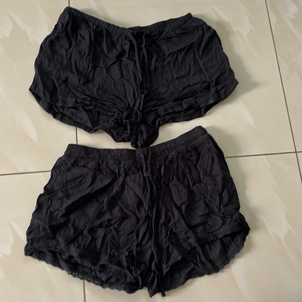 2 pairs of black shorts